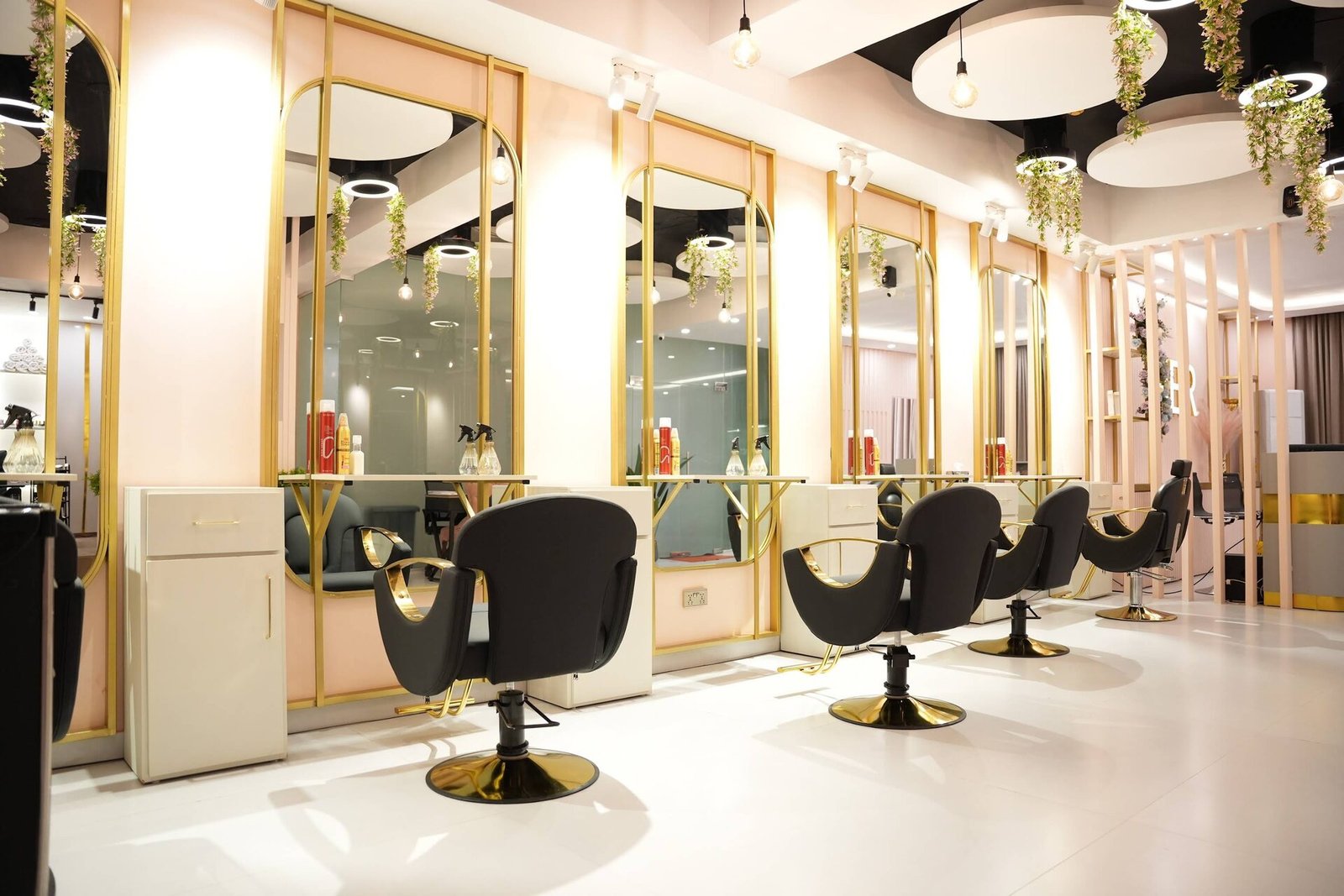 Row of salon chairs and mirrors